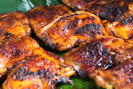 Chicken grilled on white dish .の写真素材