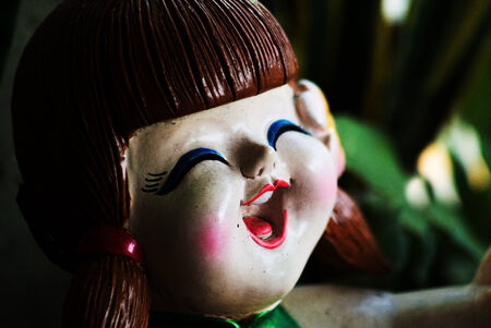 Antique doll smile still life .の写真素材