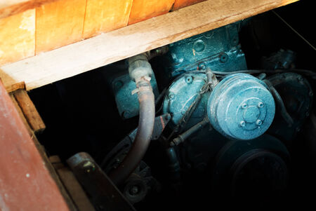 Old green diesel engine in sift light .の写真素材