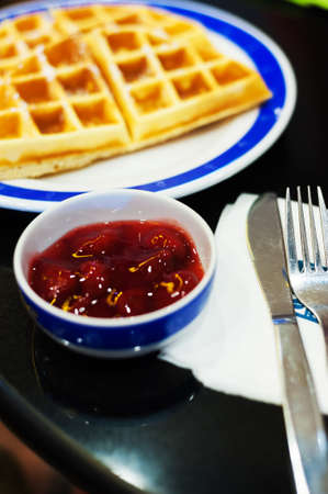waffles withstawberry and caramel sauce .の写真素材