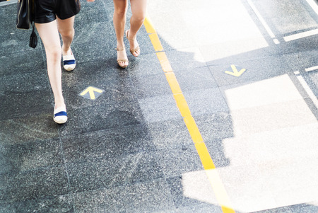 female walking with two arrows .の写真素材