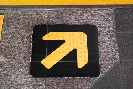 An Arrow on ground floor .の写真素材