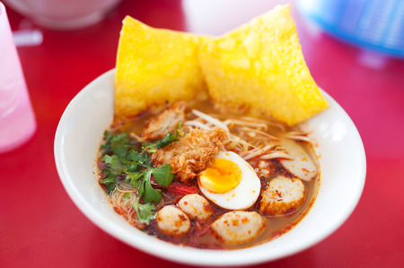 Pork noodle tom yum, condensed water egg .の写真素材