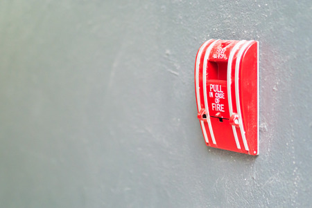 An  Fire Alarm near door fire .の写真素材