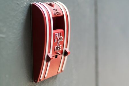 An  Fire Alarm near door fire .の写真素材