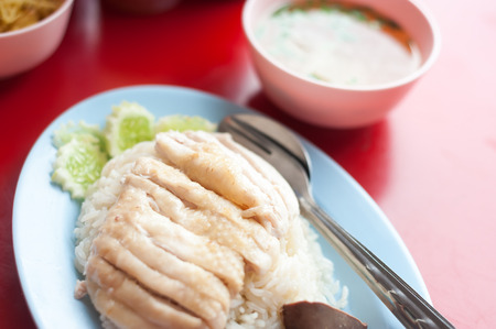 Chicken and rice thai food in soft light .の写真素材