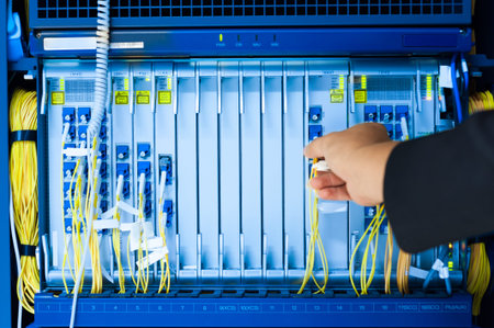 People fix core switch in network room .