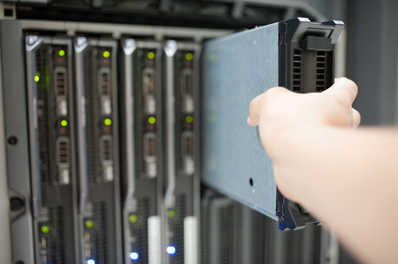 Man fix server network in data center room .の写真素材