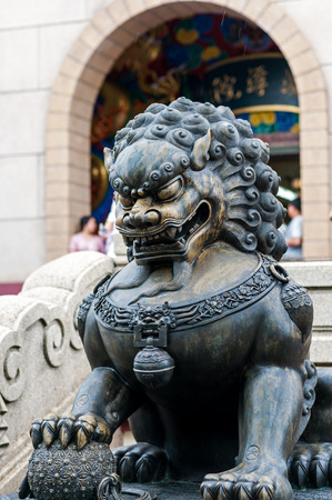 Lion statue in nature place soft light .の写真素材