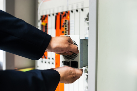 Fix network switch in data center room .の写真素材