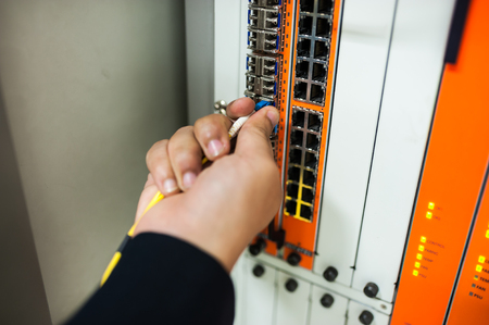 Fix network switch in data center room .の写真素材
