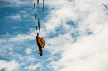An Crane in construction with blue sky .の写真素材