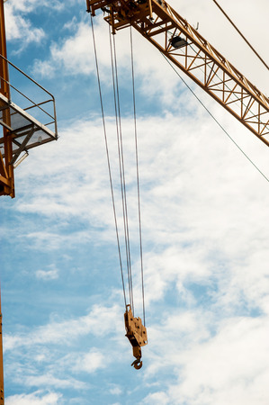 An Crane in construction with blue sky .の写真素材