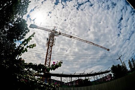 An Crane in construction with blue sky .の写真素材