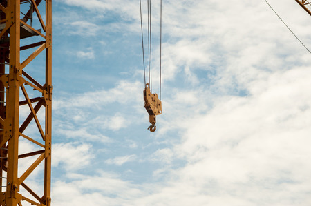 An Crane in construction with blue sky .の写真素材