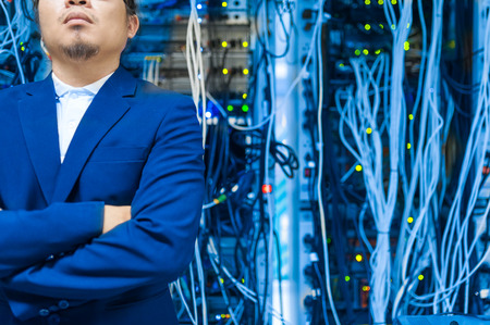 People fix core switch in network room .の写真素材