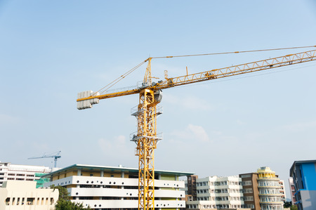 An Crane in construction with blue sky .の写真素材