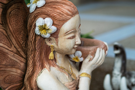An Statue angel ancient symbol old face .の写真素材
