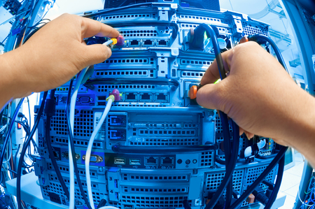 Man fix server network in data center room .の写真素材