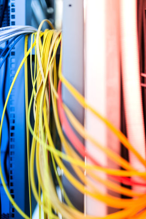 fiber optic with servers in a technology data center .
