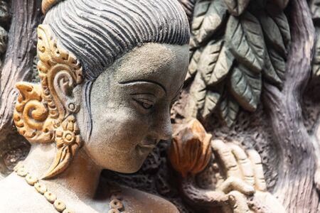 Angel statue in nature place in soft light .の写真素材