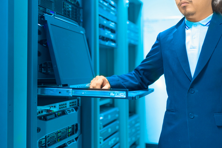 Man fix server network in data center room .の写真素材