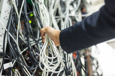 An Lan cable in network room dept of field technician .の写真素材