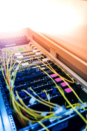 fiber optic with servers in a technology data center .