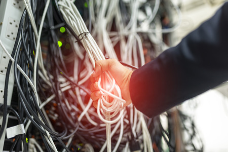 An Lan cable in network room dept of field technician .の写真素材
