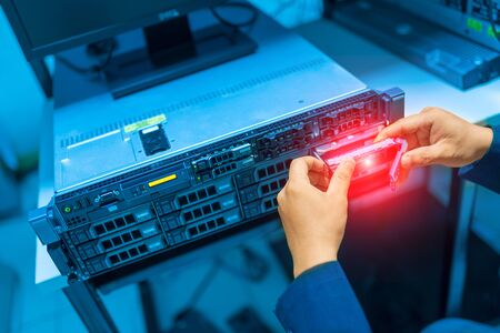 Man fix server network in data center room .の写真素材