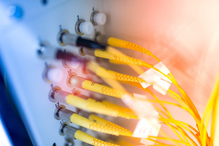 fiber optic with servers in a technology data center .