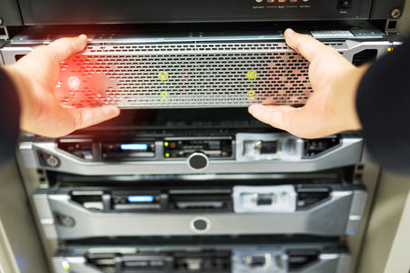 Man fix server network in data center room .の写真素材
