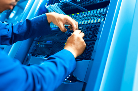 Man fix server network in data center room .の写真素材