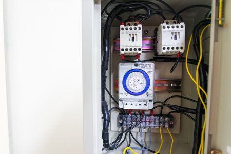 Electrical cabinet timer used to power large electrical equipment.の写真素材