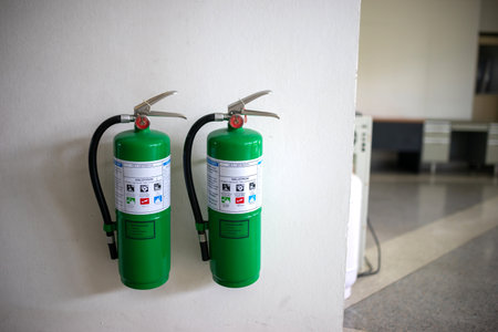 A large fire extinguisher was set up in the server room for enhanced safety.の写真素材