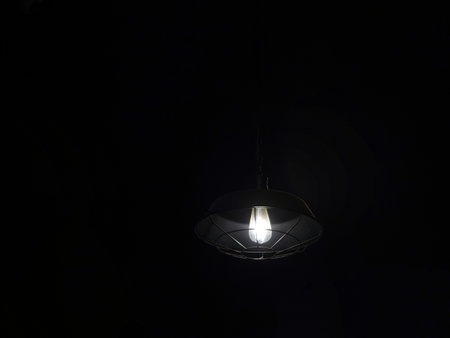 Vintage lamp on black background .の写真素材
