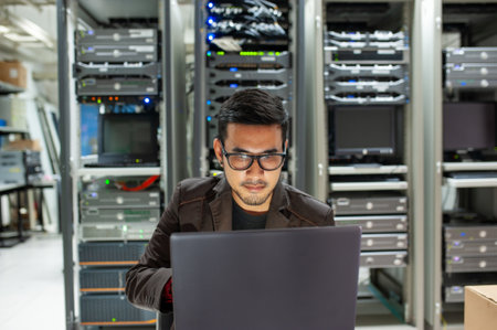 Man fixing server in data center room .の写真素材