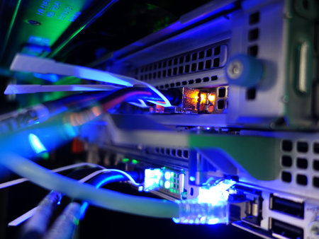 close up of network cables and servers in a technology data center.