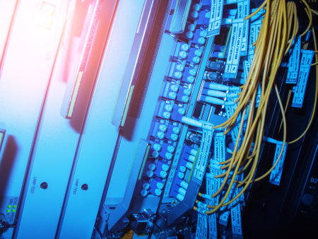 A close-up view of colorful network cables against a vibrant backdrop, highlighting technology and connectivity in a modern server room environment.の写真素材