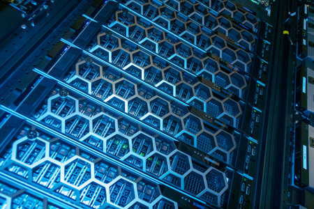 A close-up view of a high-tech server rack featuring blue lighting and a unique hexagonal design....