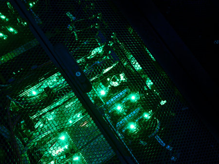 A close-up view of a computer server rack featuring vibrant green illumination, showcasing advanced...