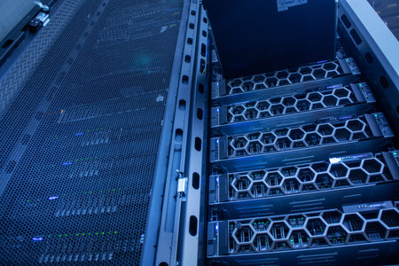 This image shows a modern server rack filled with high-tech equipment in a data center, emphasizing...