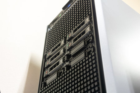 High-angle view of a server tower showcasing multiple drive bays, emphasizing modern technology and...