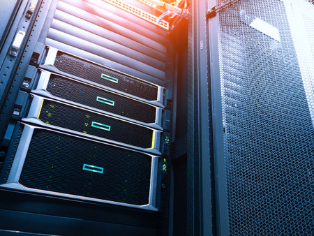 A close-up view of modern server rack units in a data center, showcasing advanced technology and organized hardware for efficient data processing and storage.の写真素材