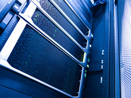 A close-up view of high-performance servers neatly arranged in a data center rack, featuring LED...