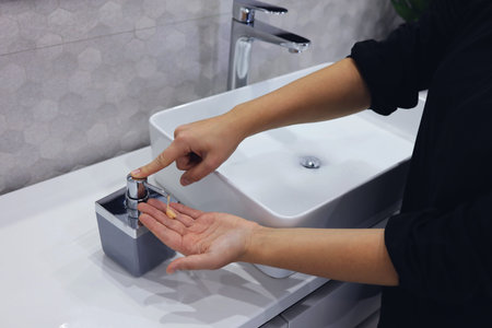 Hygiene concept. Woman washing hands close up. Hand hygiene for coronavirus outbreak.