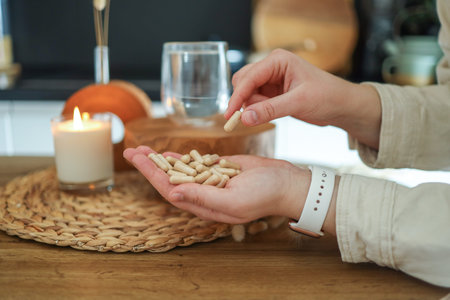 Woman, hand with vitamins and pills for medicine for depression, anxiety or mental health stress.