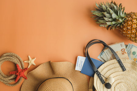 Summer background. Wicker hat, bag with passport, tickets and money, vacation concept.
