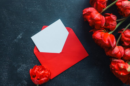 Greeting card template and bouquet of peonies top view.