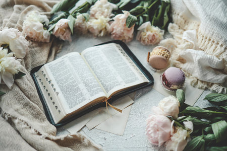 Open bible in home morning interior.
